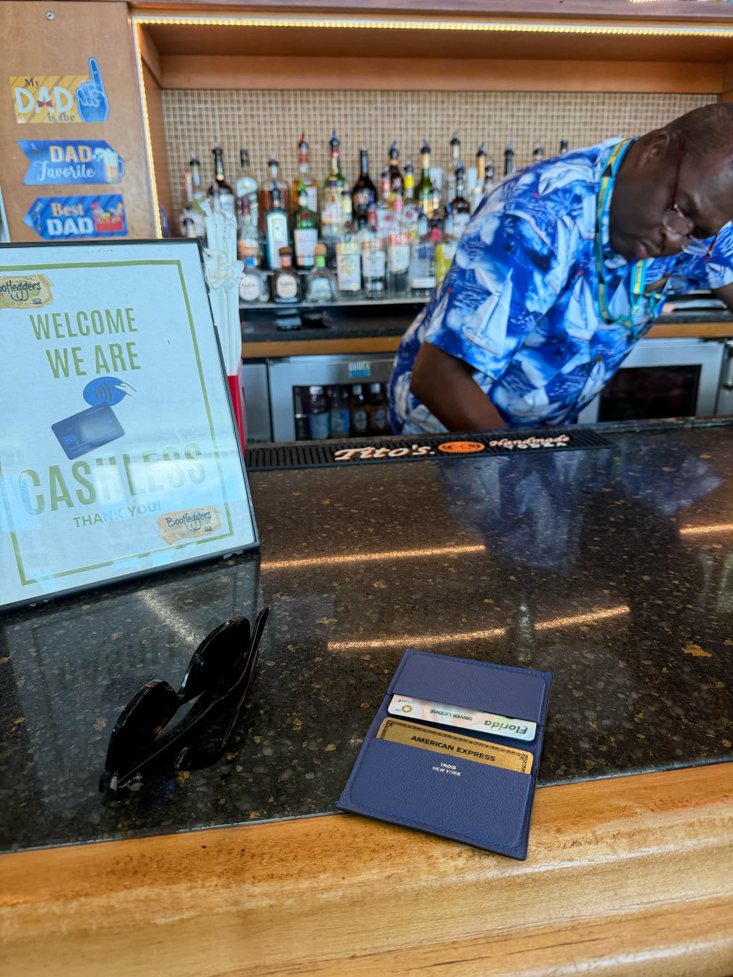 Trois wallet at the bar